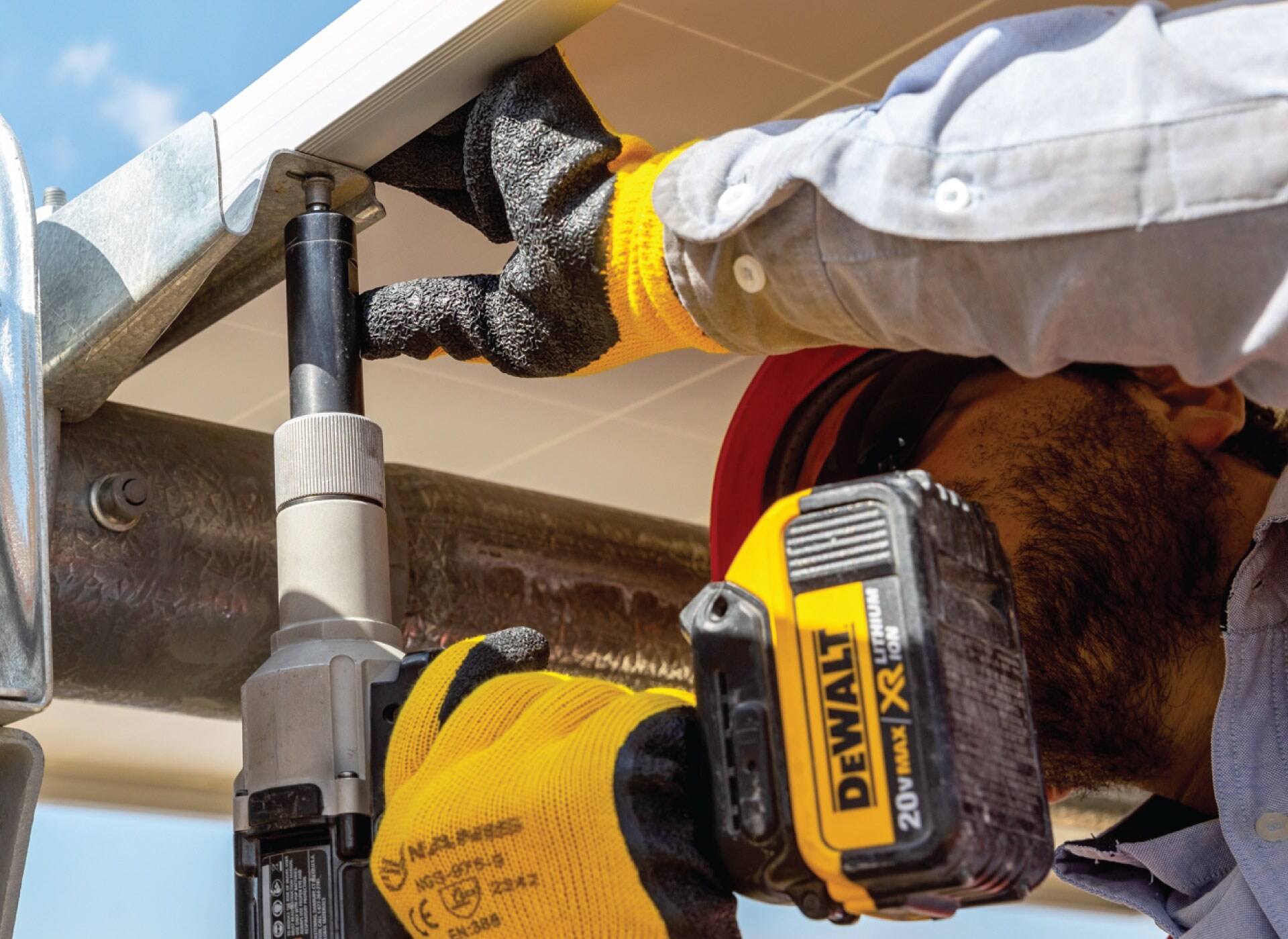 DEWALT drill installing solar panels with NexTracker