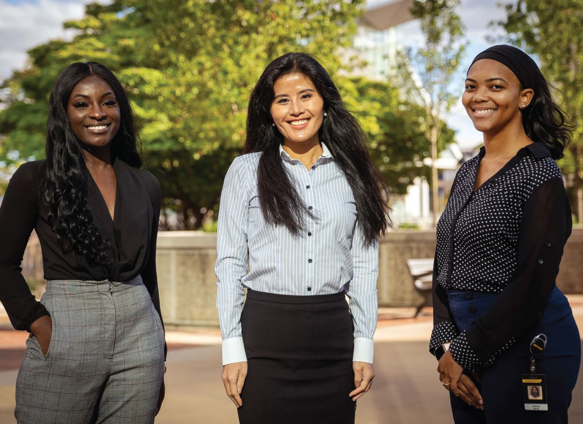 Three Stanley Black & Decker employees outside smiling