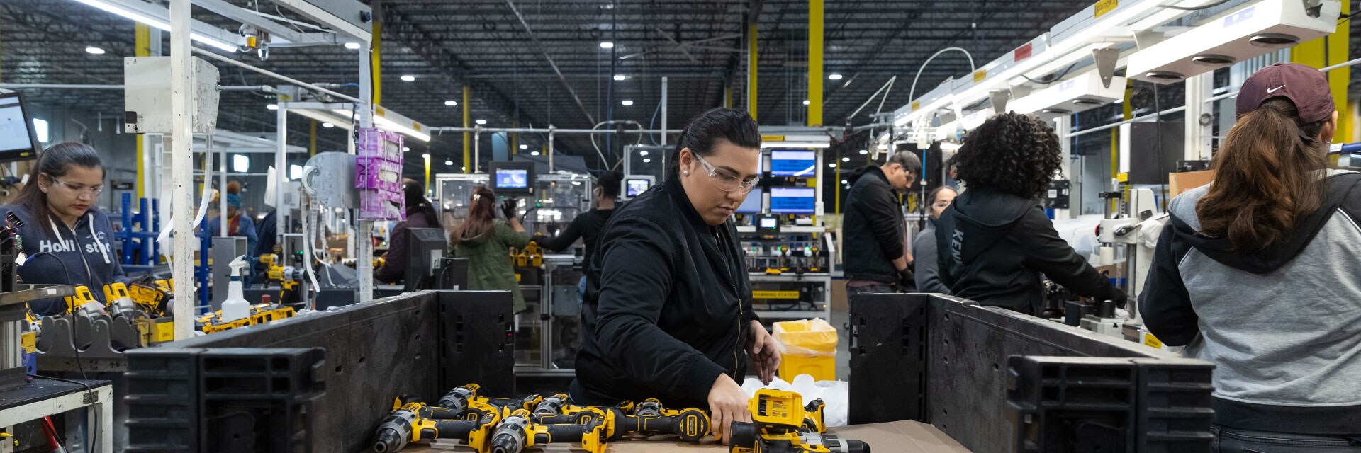 Manufacturing employees working on DEWALT tools