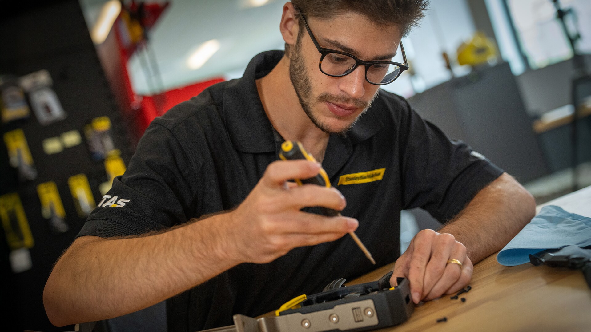 Stanley Black & Decker employee working on a tool