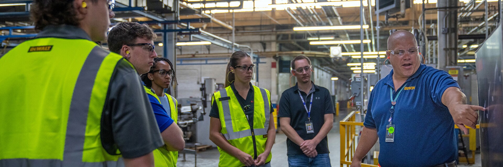 Stanley Black & Decker employees learning in a facility